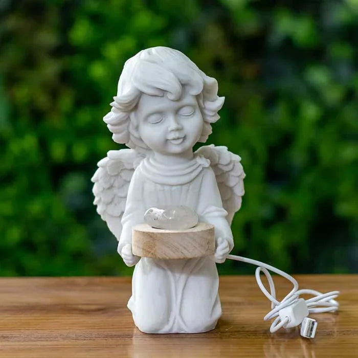 Escultura branca de anjo feito em marmorite com iluminação em LED
