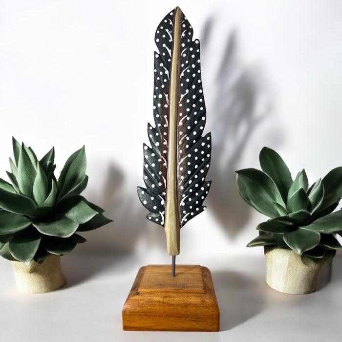 Arte feita à mão com referência à liberdade e conexão com a natureza.