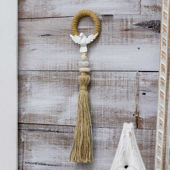 Arte brasileira — protetor de porta com símbolo do Espírito Santo.