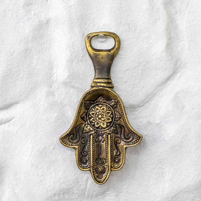 Abridor de garrafa decorativo de 16cm com design místico oriental e cabo ergonômico.