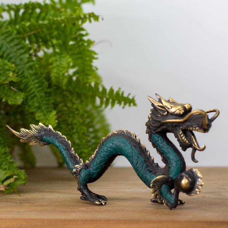 escultura dragao bronze bali indonesia simbolo protecao mitologia decoracao casa loja artesintonia