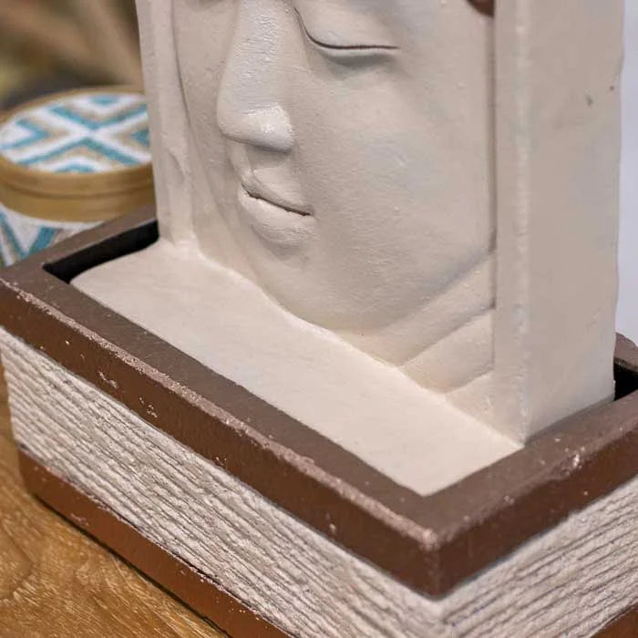 Objeto decorativo com rosto de Buda em alto-relevo, original de Bali.
