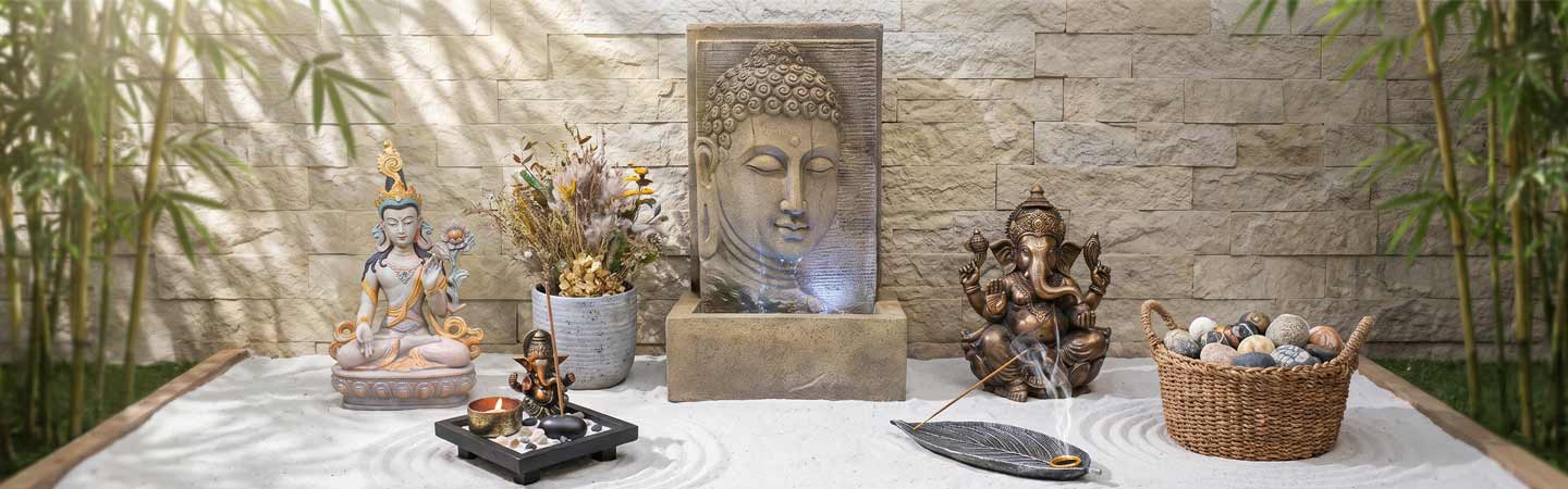 Itens chineses de buda, ganesha, incensário e outras esculturas e itens em bronze.