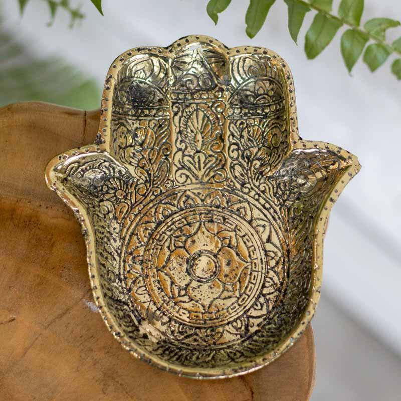 Incensário de bronze Ganesh sobre mão de Hamsá feito à mão em Bali.