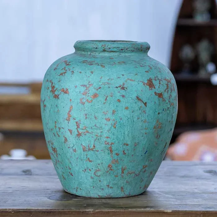 Terracota antik artesanal de Bali com formato arredondado e textura marcada perfeita para composições de Home Decor. 