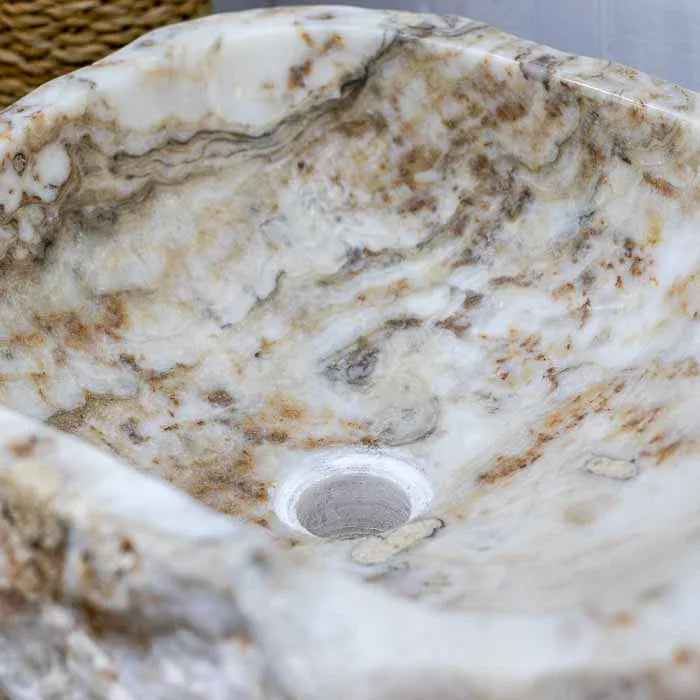 Pia de lavabo de luxo feita à mão, em Ônix com veios e cores dramáticas. 