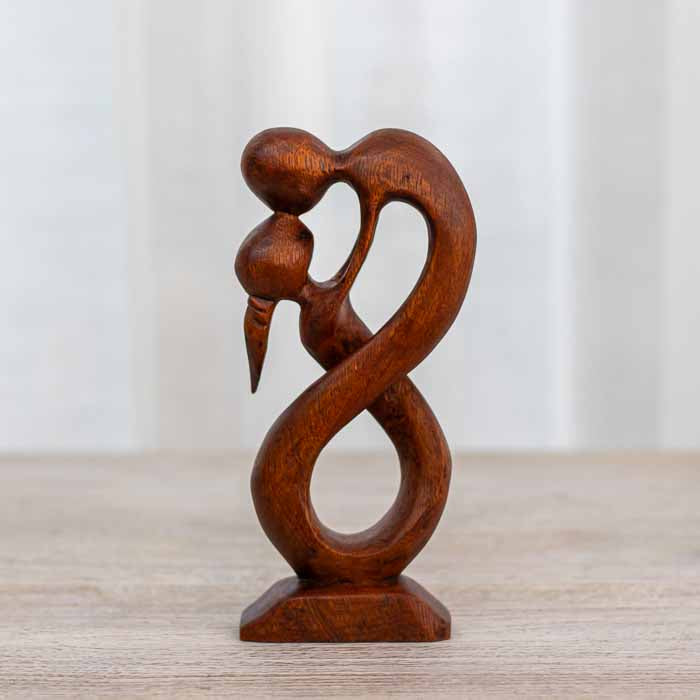 Escultura de madeira da Indonésia feita à mão para decoração de quartos e salas.