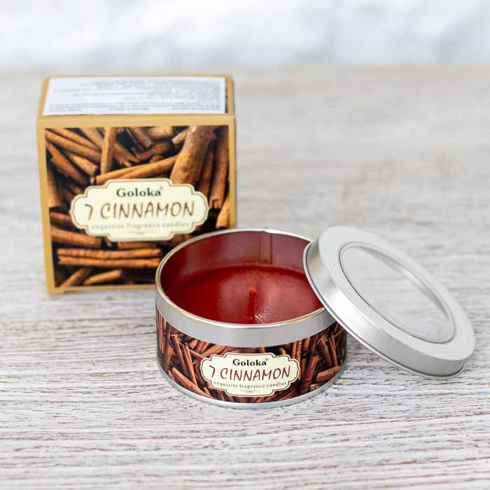 Composição de produtos perfumados Goloka com caixa e lata de vela combinando.