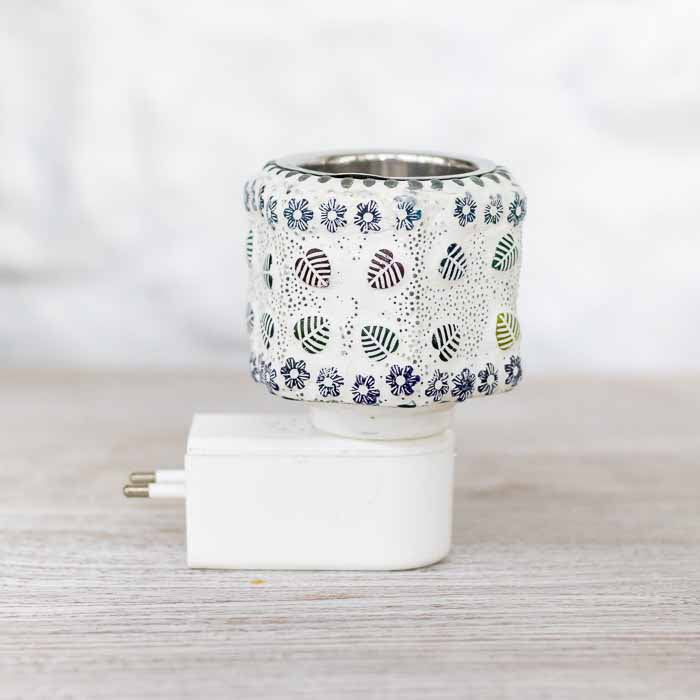 Aromatizador de ambientes de tomada compacto de 11cm de altura para decoração oriental. 