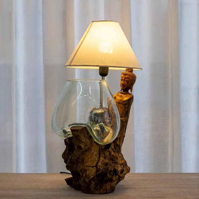 Arte decorativa importada da Indonésia: escultura de Buda com luz e elemento natural de vidro. 