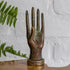 escultura maos objeto decorativo bronze bali indonesia aneis joias decoracao casa uniao amizade significado loja artesintonia 01