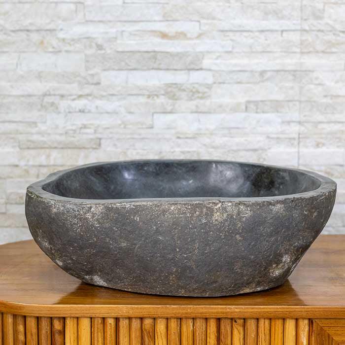 Cuba com forma orgânica esculpida à mão por artesãos de Bali 